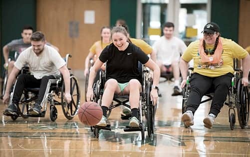 Husson University Students and Alumni Compete in Wheelchair Basketball