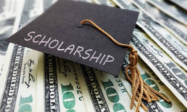 Scholarship graduation cap on money